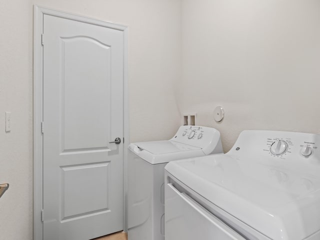 laundry area featuring washer and clothes dryer