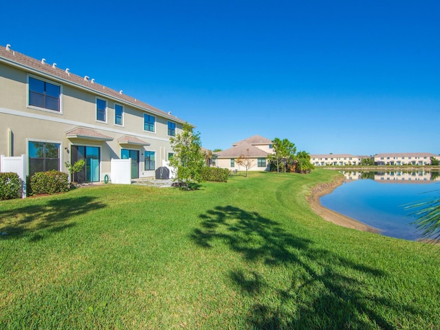 exterior space with a water view