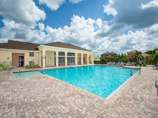 view of swimming pool featuring a patio