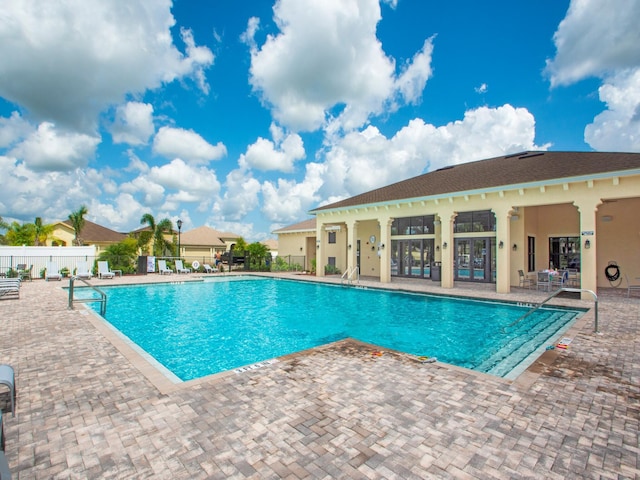 view of pool featuring a patio