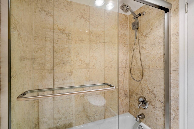 details featuring tiled shower / bath