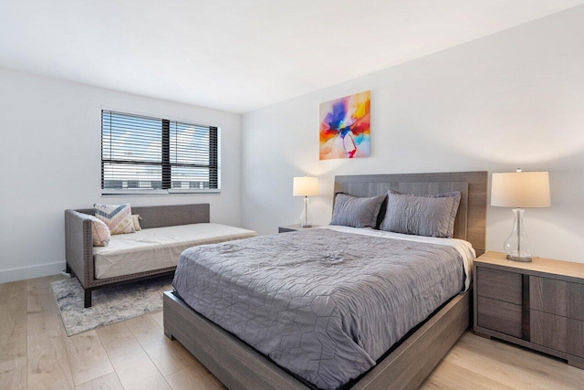 bedroom with light hardwood / wood-style floors