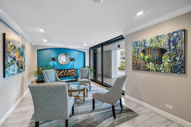 living room with crown molding and a textured ceiling