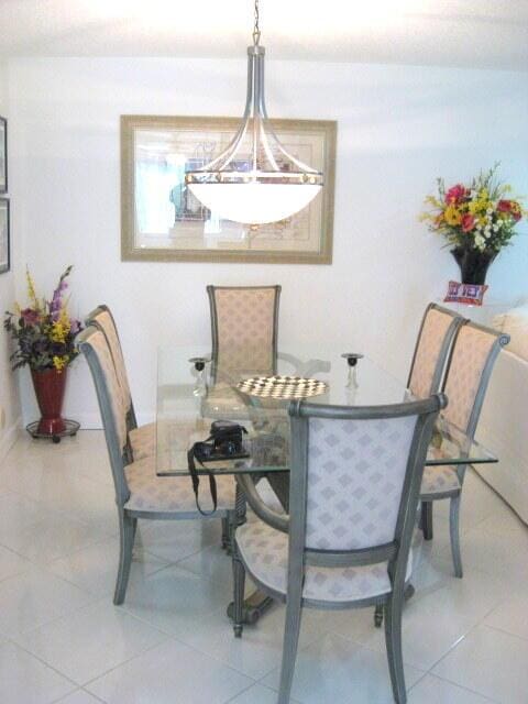 dining room with tile patterned flooring