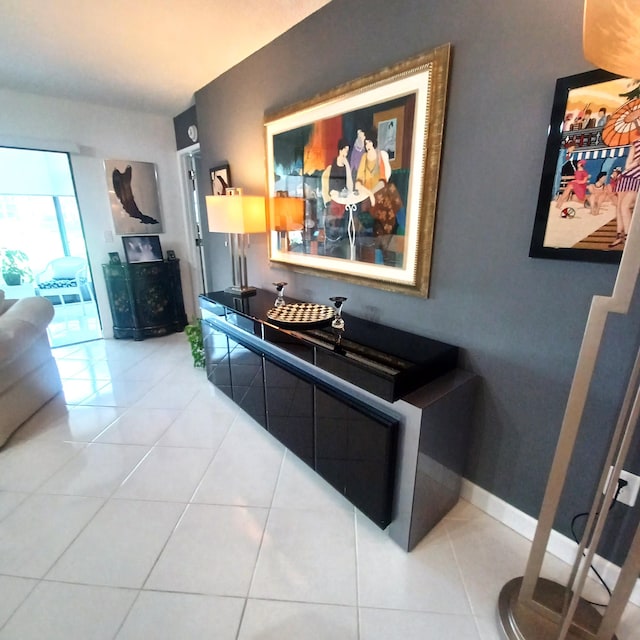 corridor featuring light tile patterned flooring