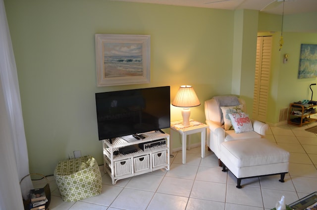 living room with light tile patterned floors