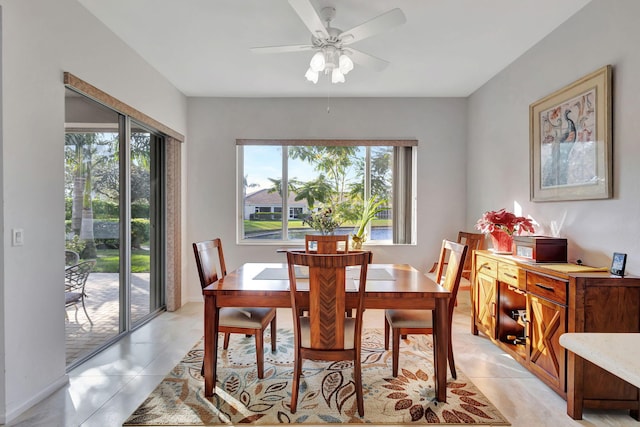 dining space featuring ceiling fan