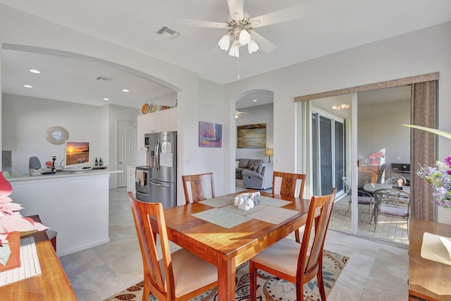 dining space with ceiling fan