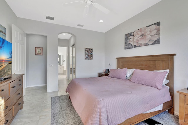 bedroom with connected bathroom and ceiling fan