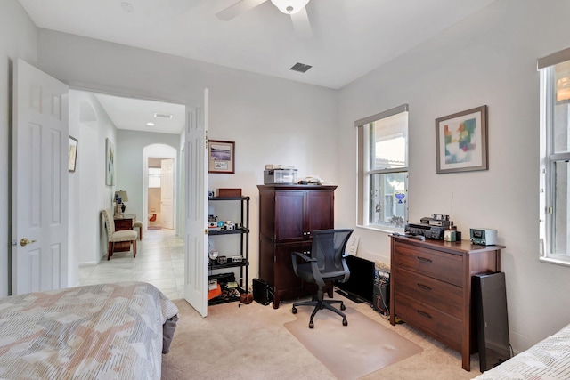 carpeted bedroom with ceiling fan