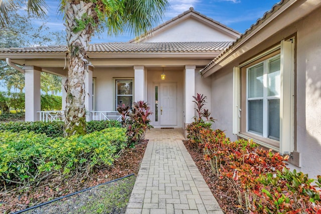 entrance to property with covered porch