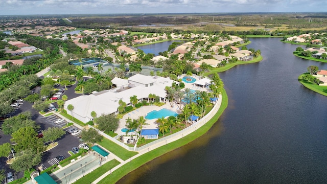 drone / aerial view with a water view