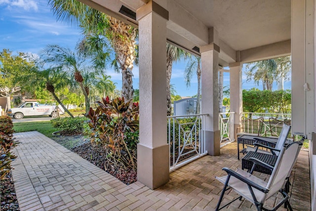 view of patio featuring a porch