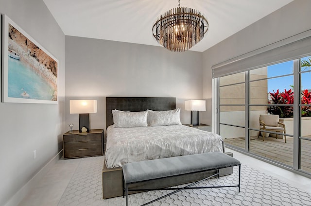 bedroom featuring an inviting chandelier