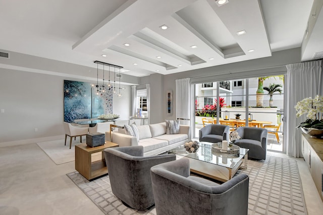 living room featuring beamed ceiling and a notable chandelier