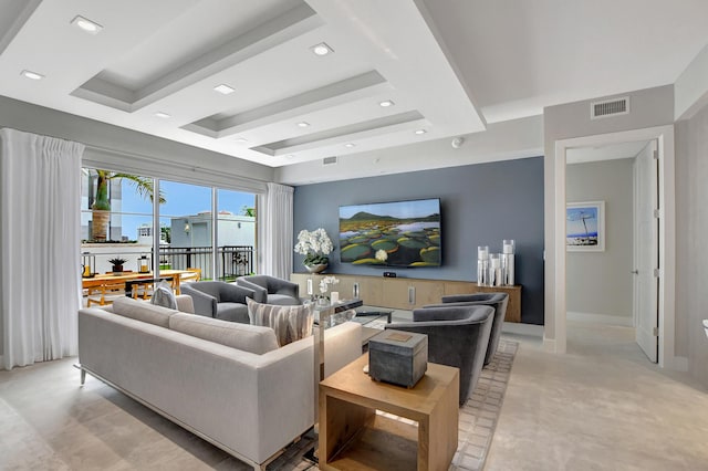 living room with a raised ceiling