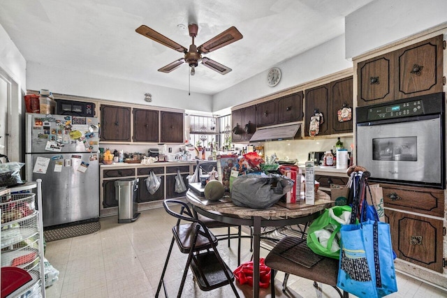 kitchen with dark brown cabinets, ceiling fan, and appliances with stainless steel finishes