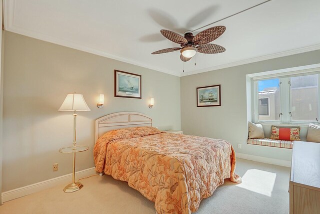 bedroom featuring light carpet, visible vents, a ceiling fan, ornamental molding, and a closet