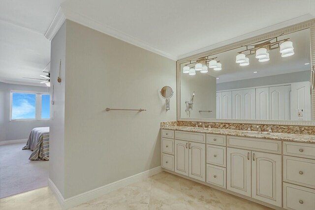 living room featuring light colored carpet, ceiling fan, and baseboards