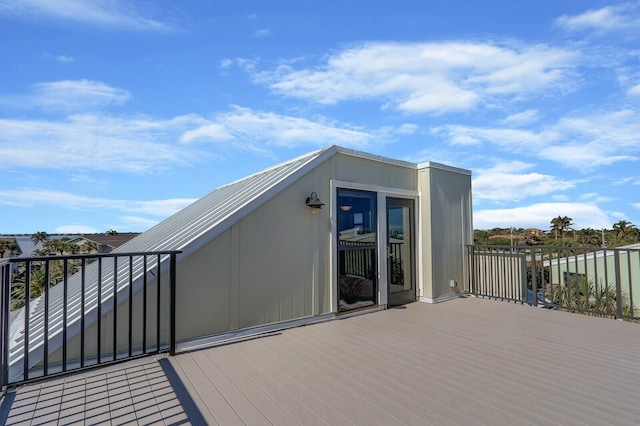 wooden deck featuring a water view