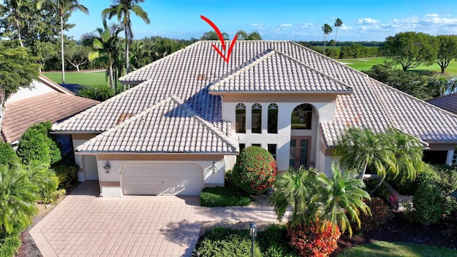 view of front of property with a garage