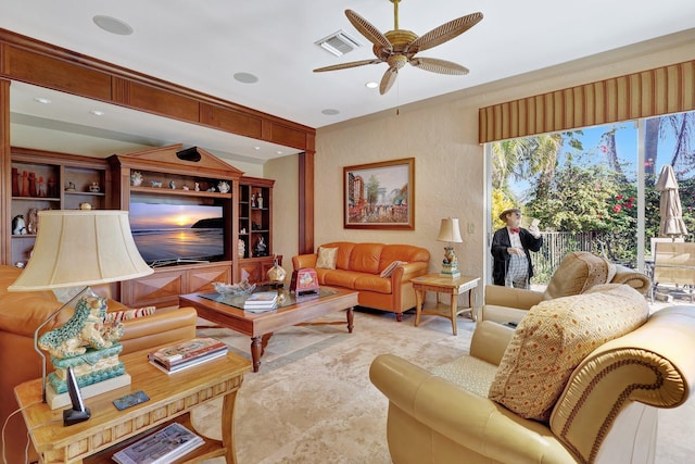 living room featuring ceiling fan