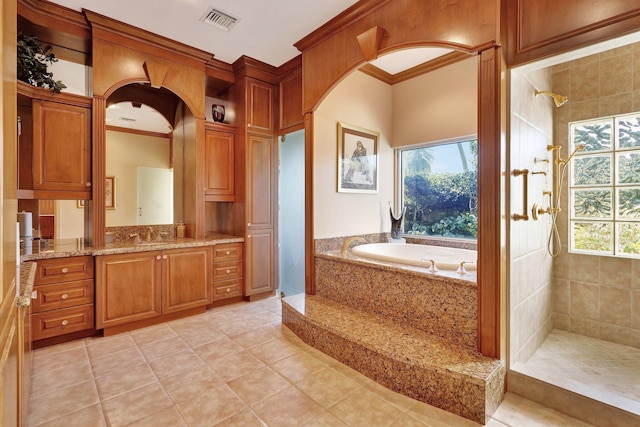 bathroom with crown molding, tile patterned floors, vanity, and independent shower and bath