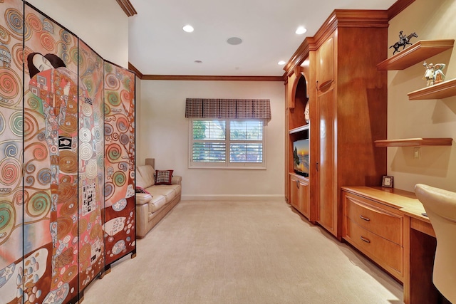 living area with crown molding, built in desk, and light carpet