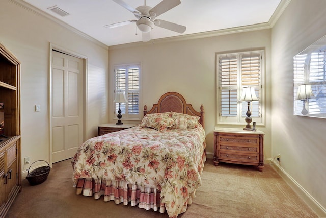 bedroom with light carpet, ornamental molding, and ceiling fan