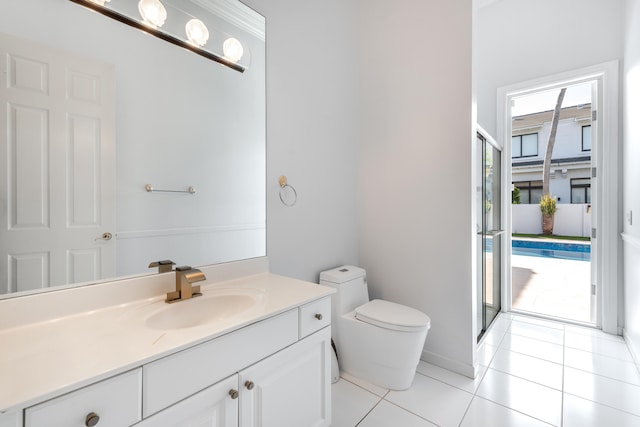 bathroom featuring vanity, toilet, a shower with door, and tile patterned flooring