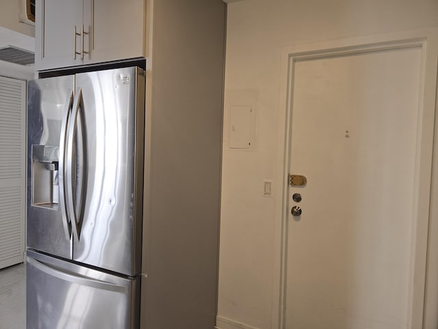 kitchen featuring stainless steel fridge