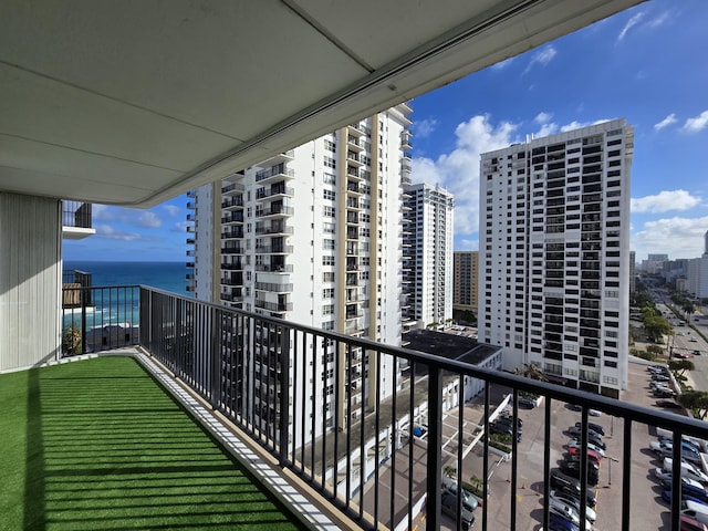 balcony featuring a water view