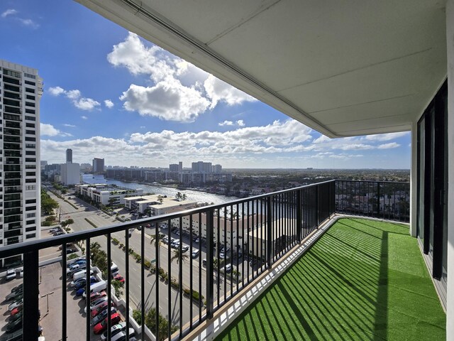 property's view of city featuring a water view