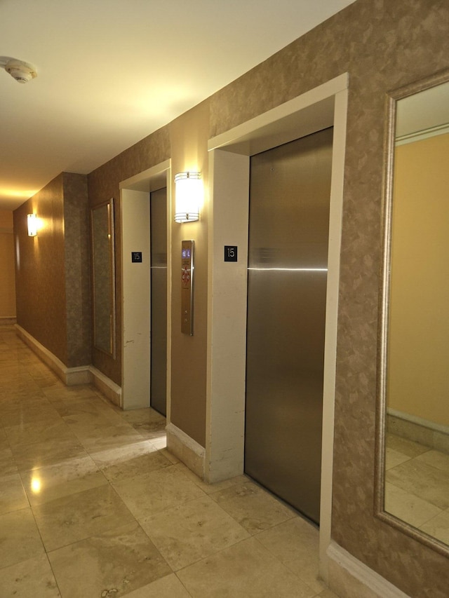 hallway featuring elevator