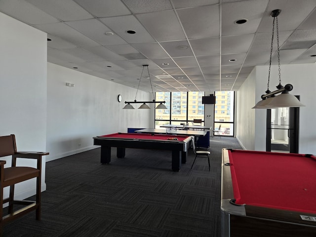 game room with dark colored carpet, a drop ceiling, and billiards