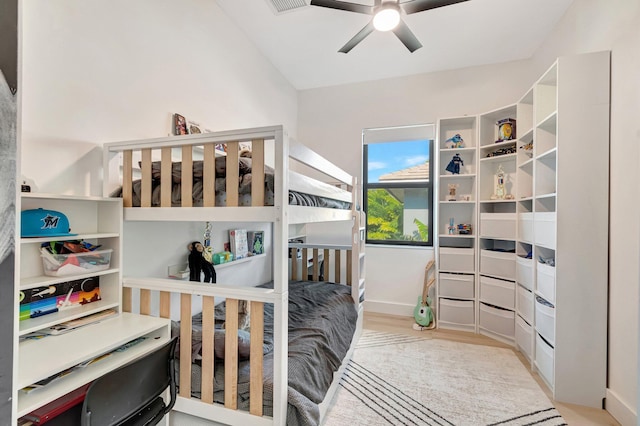 bedroom with ceiling fan and light wood-type flooring