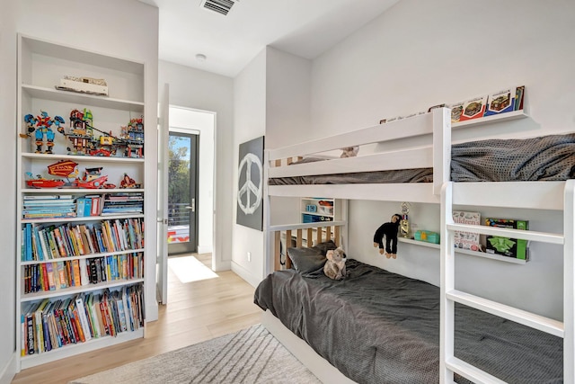 bedroom with light wood-type flooring