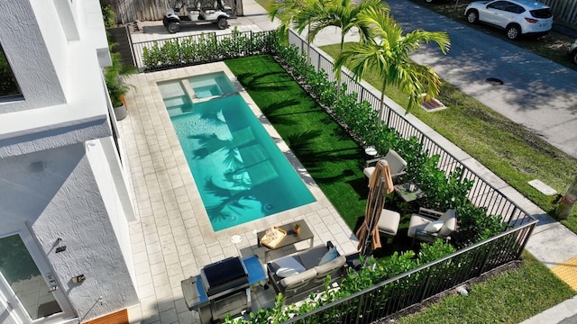 view of pool with a patio area