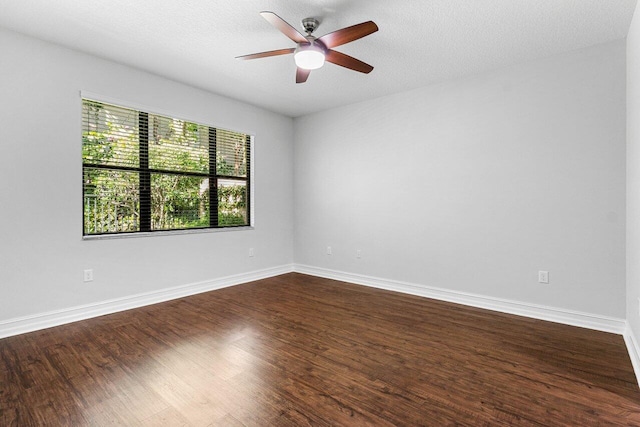 empty room with hardwood / wood-style flooring, a textured ceiling, and ceiling fan