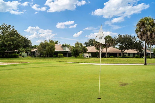 view of community featuring a lawn