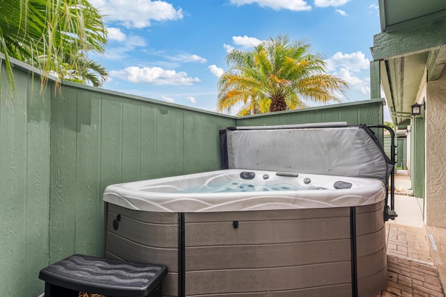 view of patio / terrace featuring a hot tub