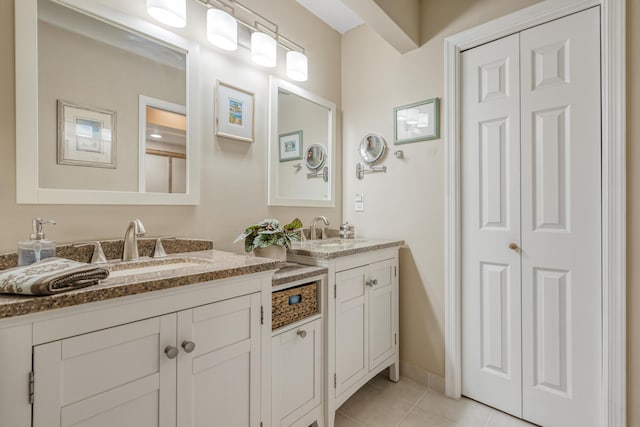 bathroom with vanity and tile patterned floors