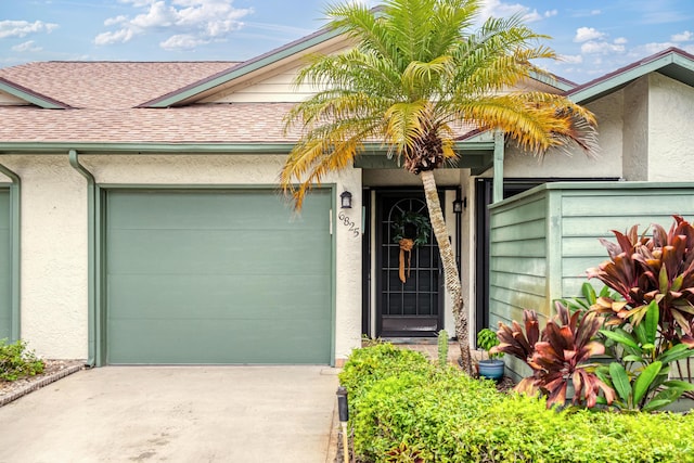 entrance to property featuring a garage