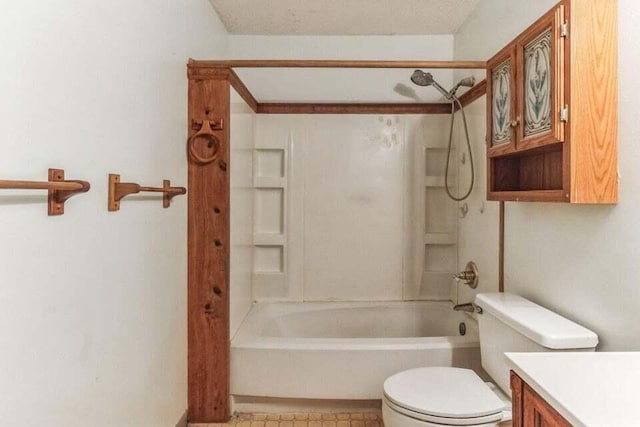 full bathroom with vanity, bathtub / shower combination, and toilet