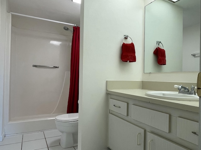 bathroom featuring tile patterned flooring, toilet, vanity, and a shower with shower curtain