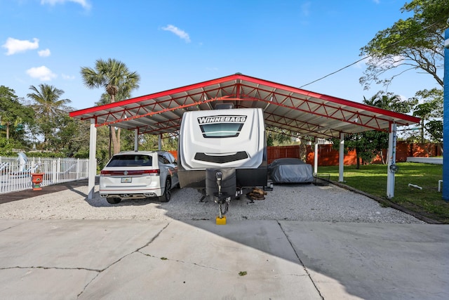 view of car parking featuring a carport