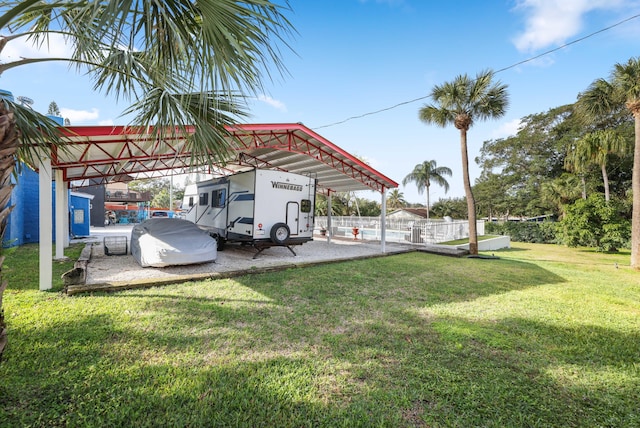 view of yard featuring a carport