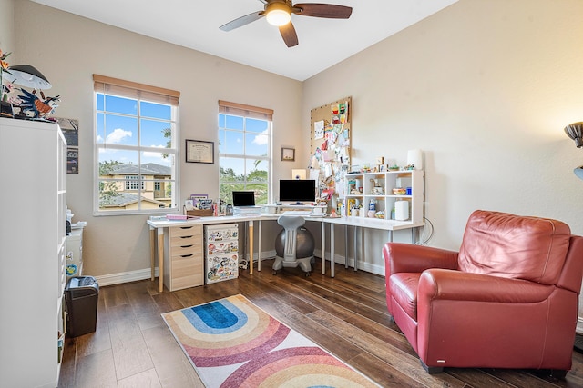 office space featuring dark wood-type flooring and ceiling fan