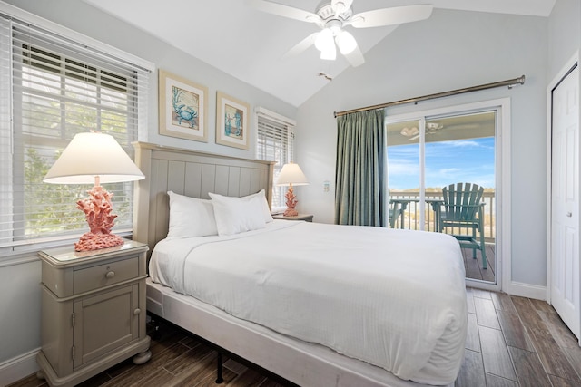 bedroom featuring multiple windows, wood finish floors, access to exterior, and vaulted ceiling