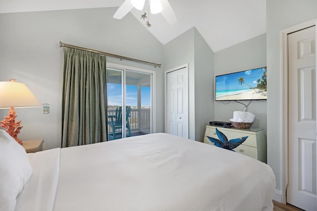 bedroom featuring a ceiling fan, a closet, access to outside, and lofted ceiling